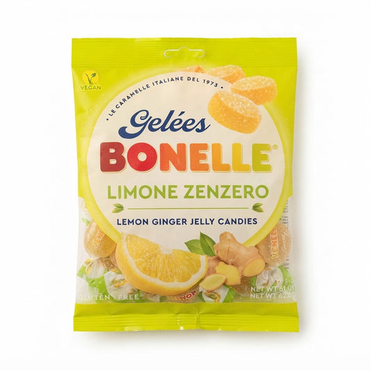 Confezione gialla di caramelle gelées Bonelle Limone e Zenzero con grafica di spicchi di limone e radice di zenzero su sfondo chiaro