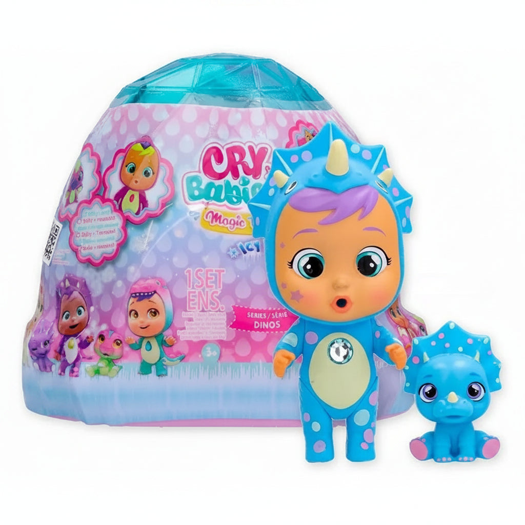 Bambola Cry Babies Magic Tears della serie Icy World Dinos in versione blu con cappuccio da triceratopo, il suo cucciolo abbinato e la confezione a forma di igloo sullo sfondo