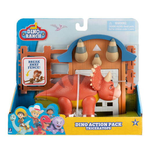 Confezione del giocattolo Dino Ranch Action Pack Triceratops con il dinosauro rosso e arancione posizionato davanti a un recinto apribile e una struttura a tema ranch