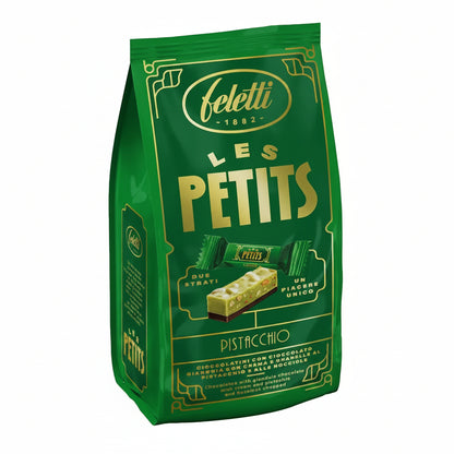 Confezione verde e oro di cioccolatini Feletti Les Petits Pistacchio con grafica dei due strati di cioccolato gianduja, crema al pistacchio e granella su sfondo bianco