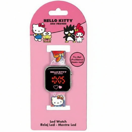 Confezione di un orologio LED digitale Hello Kitty and Friends con cassa squadrata, display luminoso rosso e cinturino rosa decorato su sfondo bianco