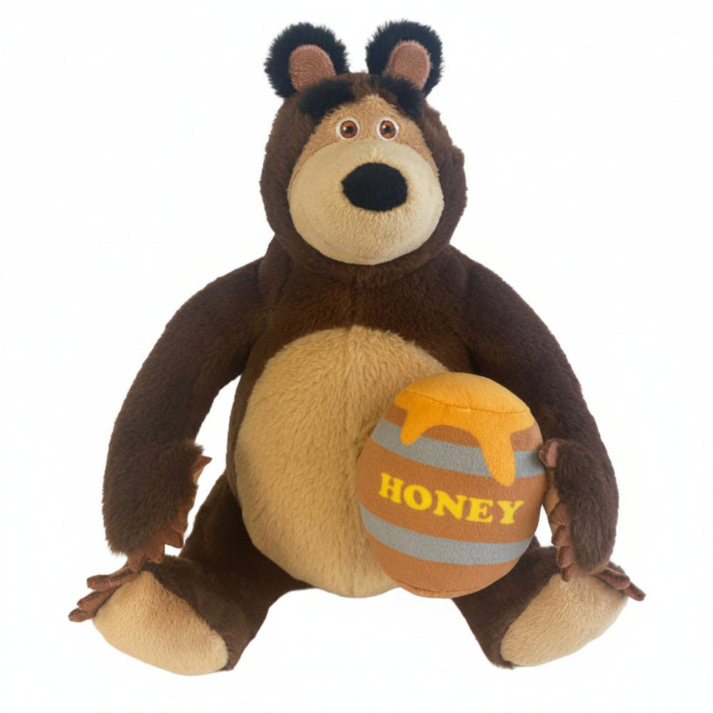 Peluche dell'Orso della serie Masha e Orso, seduto mentre tiene tra le zampe un morbido vaso di miele con la scritta "Honey"