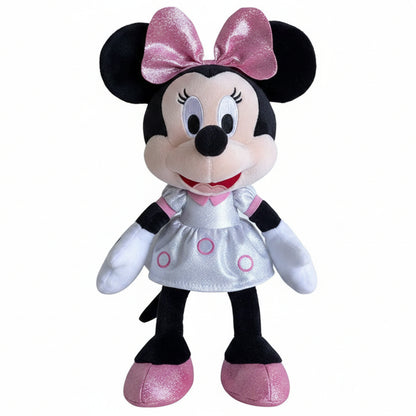 Peluche morbido di Disney Minnie Mouse con un abito bianco argentato decorato con cerchi rosa, grandi scarpe rosa glitterate e un fiocco rosa glitterato in testa