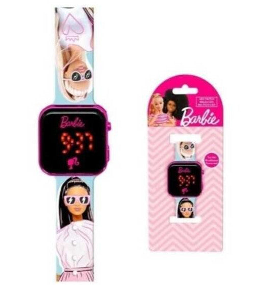 Orologio LED digitale Barbie con cassa fucsia, display luminoso rosso e cinturino azzurro decorato con grafiche fashion su sfondo bianco