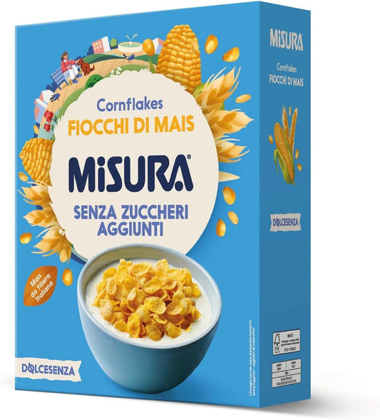 Confezione di Cornflakes Misura con mais da filiera italiana, mostrata insieme a una ciotola di fiocchi nel latte su sfondo neutro