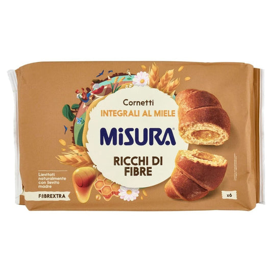 Confezione di Cornetti Integrali al Miele Misura Fibrextra, mostrati con un cornetto aperto che rivela il ripieno al miele su sfondo neutro
