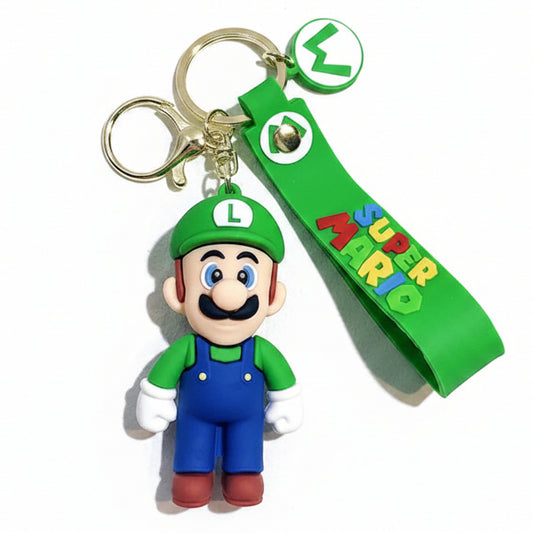 Portachiavi 3D di Luigi da Super Mario in silicone verde e blu con figura del personaggio e cordino con scritta Super Mario su sfondo bianco