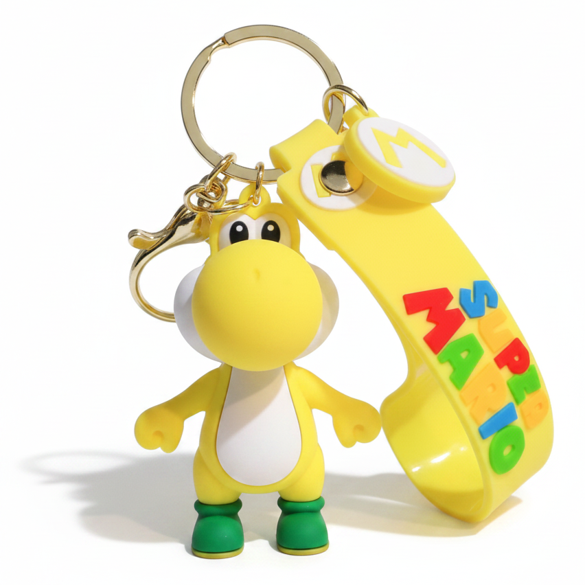 Portachiavi 3D di Yoshi Giallo da Super Mario in silicone giallo e verde con figura del personaggio e cordino con scritta Super Mario su sfondo bianco
