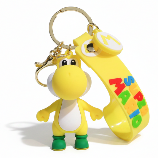 Portachiavi 3D di Yoshi Giallo da Super Mario in silicone giallo e verde con figura del personaggio e cordino con scritta Super Mario su sfondo bianco