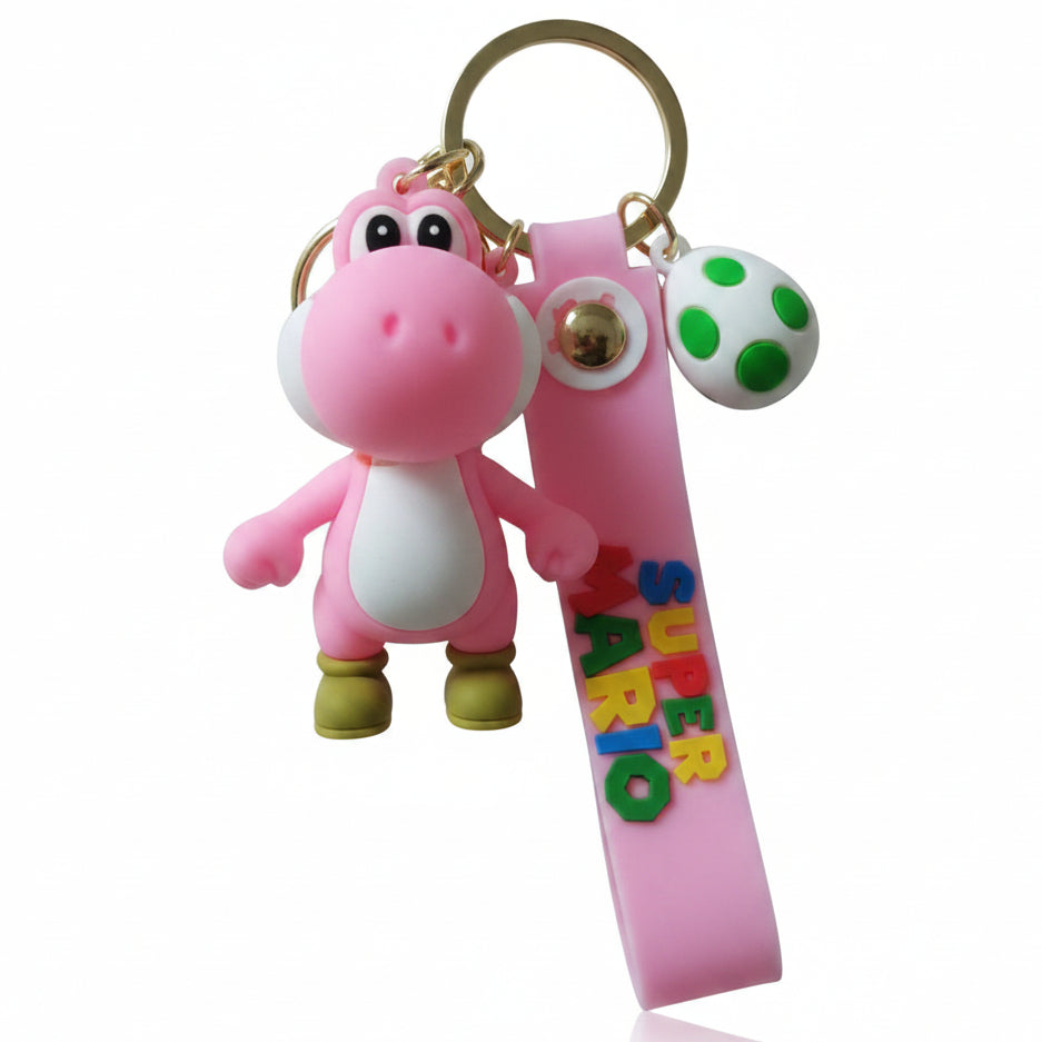 Portachiavi 3D di Yoshi Rosa da Super Mario in silicone con figura del personaggio, ciondolo a forma di uovo e cordino rosa con scritta Super Mario su sfondo bianco